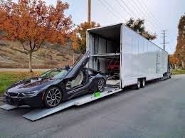 alt= "Image of an enclosed trailer auto shipping "